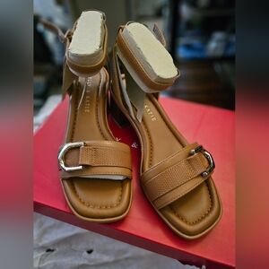 Open toe sandals with blocked heels.